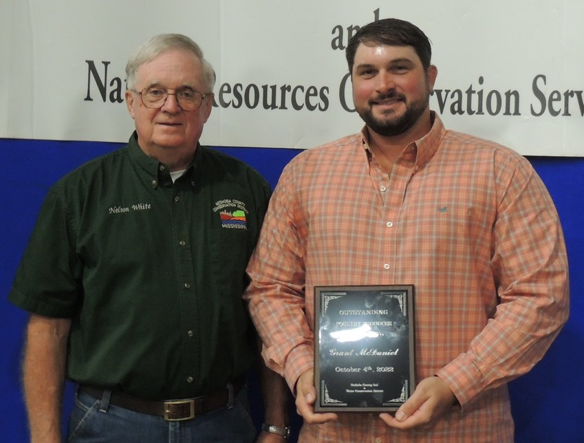 Outstanding Poultry Producer winner was Grant McDaniel. He is pictured with Neshoba SWCD Chairman Nelson White at left.